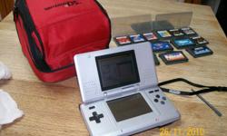 Nintendo/ DS with 12 games, rangeing from 20.00 to 45.00. comes with all game and carry back pack, and charger.