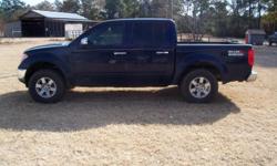 Blue in color ,4x4 loaded ,cloth seats. Four doors, clean, cd great stero. good tires. Great on gas. 67000 miles on the truck.
