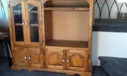 Solid oak entertainment center 53" wide by 47" high &nbsp;TV opening 25" wide by 21" high &nbsp;
&nbsp;