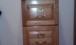 Moving sale. Light Oak finished filing cabinet. Beautiful condition.