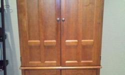 Oak Tv Armoire for sale,
Measurements of the Armoire
it is 77 1/2 in Tall x 23 1/2 in Deep x 43" Wide.
( The Depth and Width Measurements are from the Crown Moulding on the top of the Unit. )
The back has been cut out to Fit a Television in it. And other
