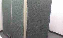 Office cubicle in good condition with 4 partitions, cabinet and desk.