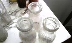 I would like 200.00 for all of the bottles there are three abbotts milk bottles,that you will not see any more they are at least 30.00 each.
there are some alcohol bottles,some ketchup,and two i am not sure of? but they are the old jars that are a light