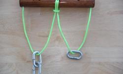 Can you get the extra link from one side too the other side. The wood is marked with two dots on one side and one dot on the other side so you will know when you've done it. About 8 inches long with about 3 feet of light weight rope and 3 chain links.