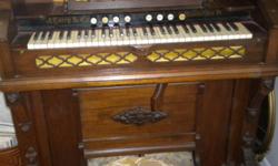 Late 1800's company puddle push and play organ beutifull.
Reduce to $450.00