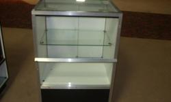 Some with metal frames, wood frames,
mirror doors, also some have lights & locks.
One of many nice showcase 39 in tall 70 in long 20 in width
glass case, mirror doors.
You can call, or you can see them at Traders World
outside shelter #369