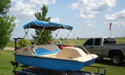 blue paddle boat with canopy and motor mount electric out board $350.00 with motor $250.00 without