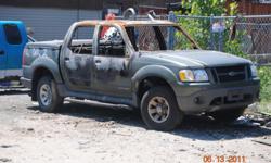 2001 ford explorer 4door pickup burnt to a crisp, good motor, salvagable parts.