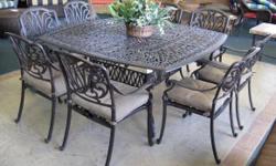 Purchase these 8 super comfortable dining chairs for $239.00 each and get this one-of-a-kind Outdoor Dining Table absolutely FREE!