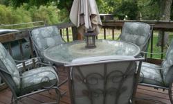 Patio set with 5 chairs Table with lazy susan very good condition $ 180.00. Call --