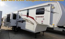 Whether you like to dance at sunrise or sunset in this 2009 Sundance your are all set! Ideal for the full time rv lifestyle thisone make you feel right at home! You will truly enjoy relaxing in the overstuffed rocking recliners while enjoying the built in