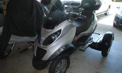 2009 Piaggio MP3 250cc ONLY 713 Miles!
Gets 65 Miles Per Gallon/3.2 gal tank
Freeway Legal
EXTRAS include: A GIVI 400 windshield (which is higher that the original, but I still have the orginal in case you want to swap them out.)
A Tow-Pac trike kit,