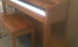 CABLE 78-79 upright piano with bench ASKING $750 !!! this is a darker wood very nice beautiful piece. sounds good ready to go... no major damage at all.. a couple little scratches on the wood at the bottom but nothing major or very noticable, still a very