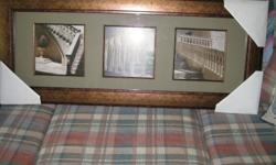 41 inches x 17 inches solid brown with gold inflection. Three matted pictures within the frame of Grecian columns, stairways. Quite elegant. Never hung, never used.