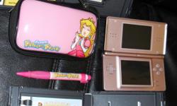 Pink DS with Princess Peach case. has 2 games: My Sims Kindom & Ener-g Dance Squad. I Bought it for my granddaughter she only played with it a couple hours on saturdays. I have had it for 9 months. I paid $ 170.00 new.