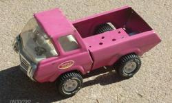 This is Tonkas pink truck for girls.&nbsp; It is missing the cover on the back but still in fair condition
