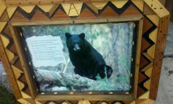 Dimension: 63H x 74 W
Hand crafted solid red wood lattice frame. This beautiful Western art piece will bring characteristic inspiration to any home. A California Black bear sits contemplating in the forest next to a timeless poem which reads:
If you stand