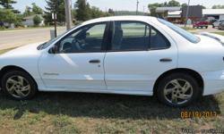 2000 Pontiac Sunfire. Very low miles-under 60,000-owned by elderly couple. White in color. Interior is in mint condition. Exterior is showing some small signs of rust but not bad. Please contact Kelly 231-675-0948 call or text