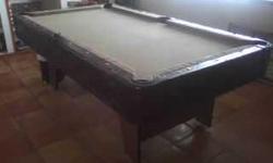 Excellent table with 3/4 in. slate, comes with 7 very stright cue sticks an extra set of balls and several racks. Need to sell before my ex claims it. This is why the price is so great. I need your help, better you then her. Call Jamie at 602-718-9018 if