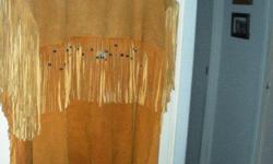 Posting for my mother so please email me for her phone number
We have two brown leather (buckskin) Native American Indian leather dresses used for primitive camping - pre American Civil War reenactments. The dresses are in excellent condition and are very