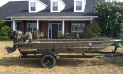 2006 16 ft Express boat (gun box/rod box, floor kit, camo, rhino lined) with a 27hp Pro Drive Motor with reverse. Call for more info cell 903-702-8744 (no emails please)