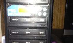 Three disk duplicator. Brand new only used twice. Burn DVD's and CD's.