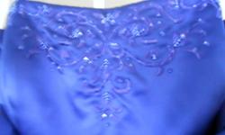 Would you like to be the envy of your prom? This dress can most certainly make it happen! Elegant, Royal Blue dress with beaded bodice and spaghetti straps. This dress is figure flattering as it flows gracefully from the bodice. Worn once, this dress is