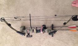 70 lb bow excellent cond, site pins, silencers and carbon arrows