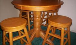 Pub set oak table with four stools, in excellent condition.