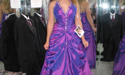 Beautiful Purple Dress worn in State level pageant has a shimmer to it. Size 6. Has a small tail train in back. Size 6. Price may be negotiable.
This dress has now been sold. Thanks for viewing.