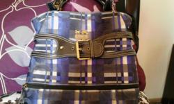This is an imitation Purple plaid Coach purse.&nbsp; I paid $50 for it and would like to get $30 or best offer for it.&nbsp; I will not go lower than $20.&nbsp; It has been used one time and is in like new condition.&nbsp; A great present for the