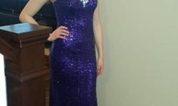 Beautiful purple size 0 prom dress, worn once. Purchase for $270.00. Selling for $100.00 obo