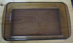 Pyrex smoky rectangular baking pan in fantastic condition. No chips or cracks.