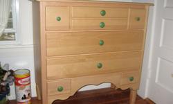 Beautiful, well-made furniture for a baby or child's room.&nbsp; Light pine with sage green drawer pulls.&nbsp; Dresser has three roomy drawers and changing table/dresser has three good-sized drawers with a pull-out dual shelf for storing diapers or extra