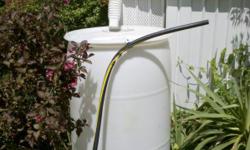 55 gal size rain barrels
colors "White" & "Blue" & "Black"
they have a brass and or PVC spickot "as not to rust" at bottom
Aprox 6" hole at top w/wire screen over it to keep "stuff out"
overflow hole on side
all rain barrels are guarenteed 1 yr of "not to