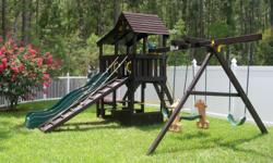 This is a large, very sturdy, redwood RAINBOW Brand Outdoor play set that is like new. It has been regularly stained/preserved and is outstanding condition. It has a climbing ramp to the elevated clubhouse and a slide down as well as two swings (can use