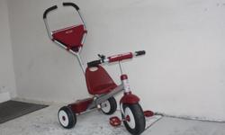 FOR SALE RADIO FLYER TRICYCLE FOR GIRLS OR BOYS.
With an innovative internal geared steering feature that allows an adult to turn the front wheel with a push handle, the Deluxe Steer & Stroll Trike from Radio FlyerÂ® includes freewheeling pedals that allow