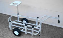 UP FOR SALE IS A REELS ON WHEELS JR ALUMINUM PIER CART. I HAVE HAD THIS FOR SEVERAL YEARS BUT HAVE NOT USED IT IN THE LAST 5 OR 6 YEARS WHEN I STOPPED PIER AND BRIDGE FISHING AND STARTED KAYAK FISHING. I WAS KEEPING IT IN CASE I DECIDED I WANTED TO DO