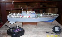plastic rc gun boat, 21 inches, twin electric motors ready to run and in great shape. pick up locally.