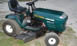 LAWN GREEN IN COLOR 6 SPEED/WITH REVERSE NEW BLADES/BELTS/ECT RUNS GREAT LIKE NEW 15HORSE POWER. NICE TIRES MUST SEE TO APPREICATE DRIVE AND RIDE CASH ONLY