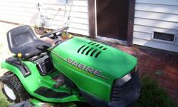 John Deere riding lawn mower.It's in great shape.Low hrs stored for 8 yrs.It has 14.5 hp moter 38" cutting area everything in good working condition start and go.(even for a beer LOL)