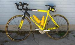 Giant Road Bike. yellow, like new condition. $500 racing wheels. measures 32 3/4 inches on top of fame at the steering head. SPD pedals. Used very lightly. Finger tip shifting. triple cranks make for easy climbing, Cateye speedmeter.