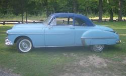 1950 Oldsmobile Rocket 88 Futurama. &nbsp;V8 Runs and drives, (but not far!). &nbsp;Two tone light blue/dark blue top 2 door sedan. &nbsp;Glass is a little weather beaten. &nbsp;Interior could use a refresher course. &nbsp;Body is streight with minimal