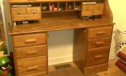 Beautiful roll top desk. Excellent condition. Please call 850-212-5278 and leave message.