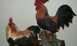 Beautiful set from the Roosters of Dresden, Ohio shop. The Rooster measures 20"H x 19"L x 8"D, the Hen measures
12"H x 15"L x 8"D. Call --