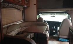 2013 COACHMEN LEPRECHAUN, Chevy chassis, 5 yr extended warranty, upgrade package, large capacity storage, upgrade bed with custom mattress, pop out side, electric awning, outside TV, less than 7000 miles.