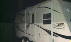 2008 Trail Sport19 ft long only weighs 3200 lbs camper only used 3 times in mint condition Can sleep 9 but 6 is comfortable. Does NOT have slide out a bed pops out front size of King bed and a bed on each side on back pops out with canvas on top full bath