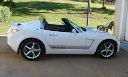 Saturn Sky Redline Roadster, convertible, 2 seater, automotic, A/C, turbo, power windows, 6 CD changer, new tires, new brakes, still under warranty, 51,000miles, white with gray racing stripes, very fast! EXCELLENT CONDITION. Call 561-732-4715 or