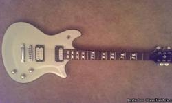 White Schecter Tempest Custom for sale. Paf Pro and D-Sonic pickups, awesome guitar in good condition. Asking $260 for it. If it makes the sale, I will even throw in Rocksmith for PS3 if necessary.