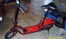 Schwinn S500 electric scooter. Red/black. Needs charger